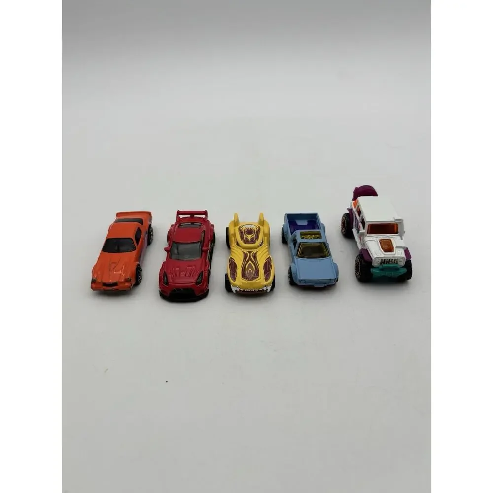 Vintage Hot Wheels Lot Of 5 Cars. FJ, Camaro, VW, Nissan GT And Howlin Heat.